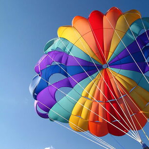 Parachute symbolising the precise processing of parachute fabrics with CO₂ laser cutting machines from eurolaser