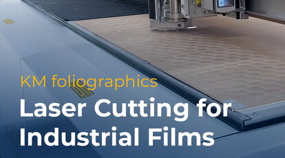 eurolaser CO₂ laser cutting machine processing films, display protection films, polycarbonate composite sheets and composite materials for precise industrial applications at KM foliographics.